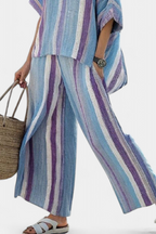 Faelith | Top elegante en tono malva pastel y pantalón de lino a rayas