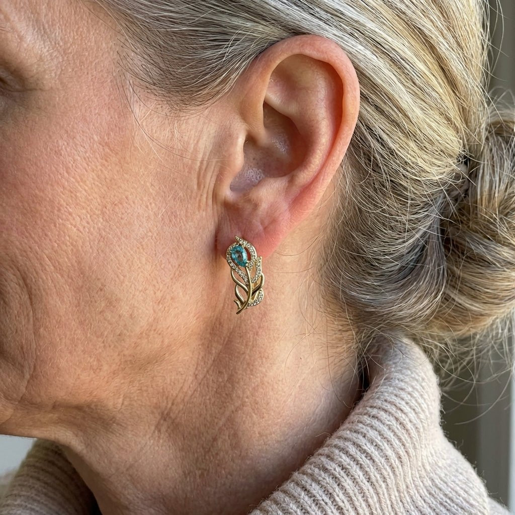 Pendientes bohemios de diseño dorado con hoja de turquesa