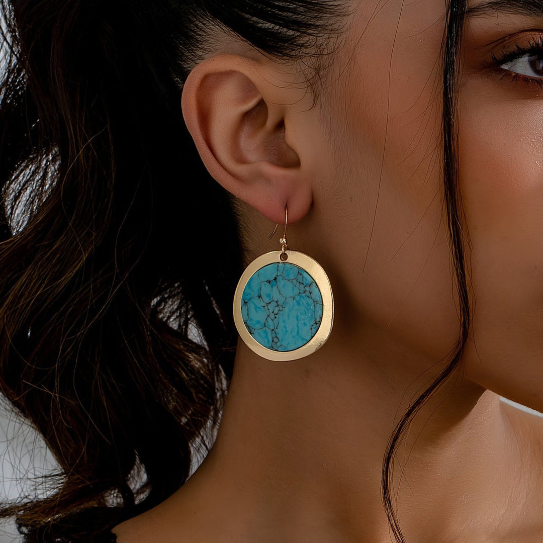 Pendientes bohemios redondos de turquesa