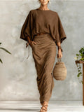 Conjunto Lila de blusa com mangas morcego e saia longa