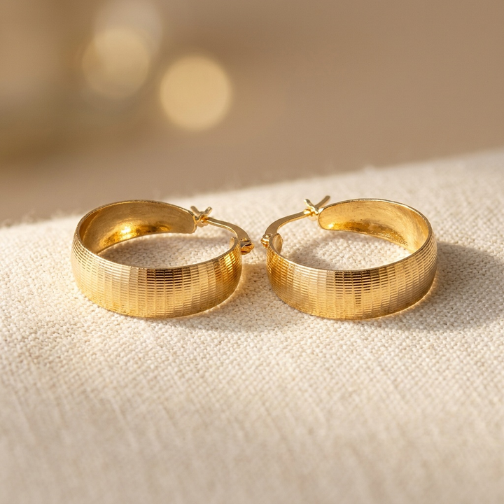 Pendientes de lujo sofisticados en oro  