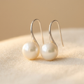 Pendientes colgantes elegantes con perlas