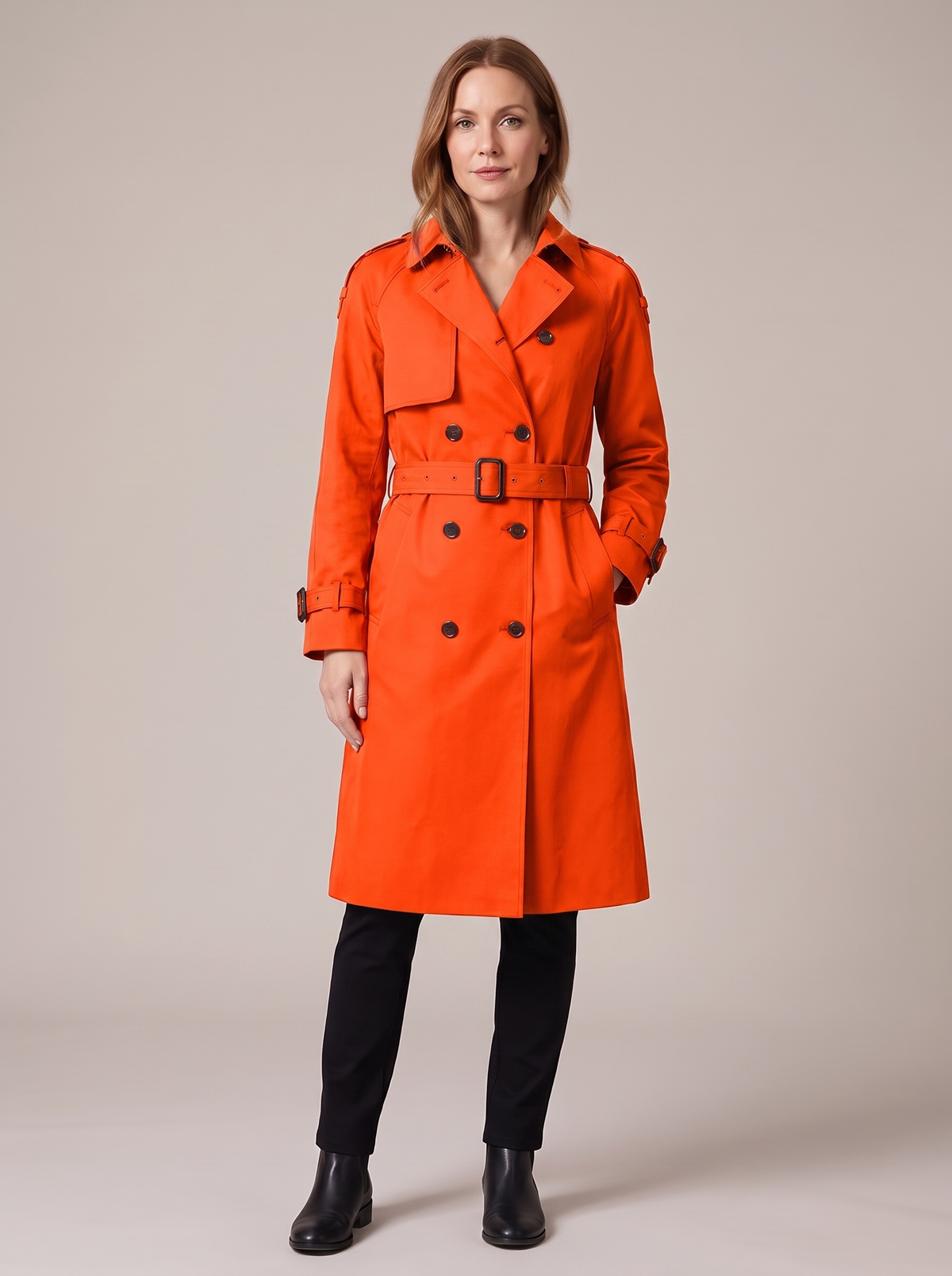 Women's long double-breasted belted trench coat in orange