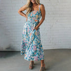 Vestido longo floral com corpete franzido e alças ajustáveis